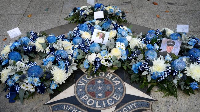 Wreaths laid at the Victoria Police Memorial for the four officers. Picture: NCA NewsWire/Andrew Henshaw