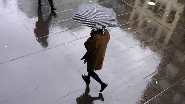 Hammering rain is on the way for Melbourne’s CBD on Thursday evening. Picture: Luis Ascui