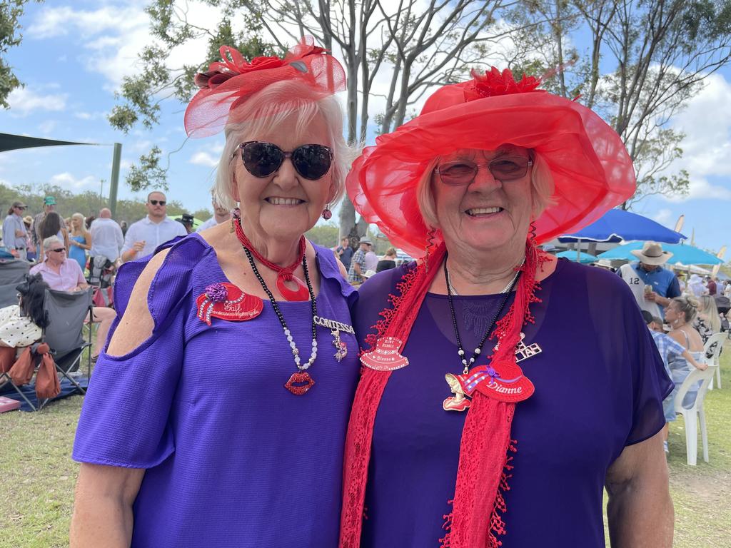 Dianne Monroe and Gail Warrilaw having a ball at the Torbanlea Picnic Races.