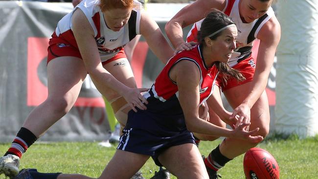 Darebin Falcons’ Stephanie Simpson is put under pressure. Picture: Hamish Blair