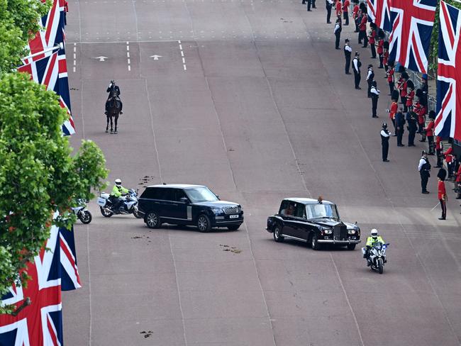 Her Majesty will remain at Buckingham Palace where she will take the returning cavalry’s salute from the balcony there.