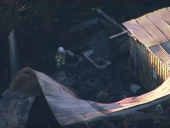 Two people have died in a caravan fire at Upper Brookfield. Picture: 9 News