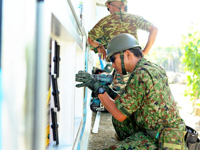 A Japanese Ground Self-Defence Force soldier works in East Timor.