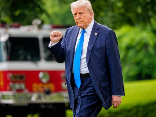 WASHINGTON, DC - MAY 1: U.S. President Donald Trump walks towards Marine One on the South Lawn on May 1, 2025 in Washington, DC. Trump is traveling to Alabama to give the commencement address at the University of Alabama.   Andrew Harnik/Getty Images/AFP (Photo by Andrew Harnik / GETTY IMAGES NORTH AMERICA / Getty Images via AFP)