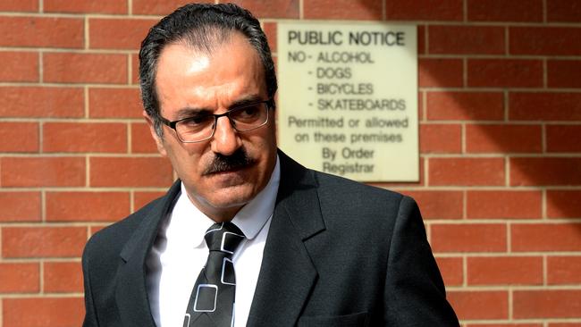 Dr Mario Athinodorou leaves Port Adelaide Magistrates Court after being sentenced. Picture: Greg Higgs