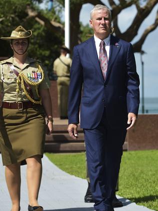 The Australian Minister for Veterans’ Affairs, Michael McCormack, pays his respects by leaving flowers during the 76th Bombing of Darwin Anniversary Ceremony