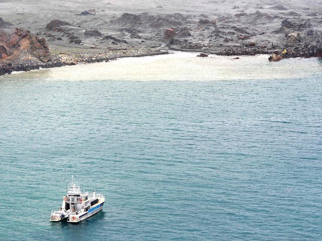 Elite soldiers (top right) taking part in a mission to retrieve bodies from White Island. Picture: New Zealand Defence Force/AFP