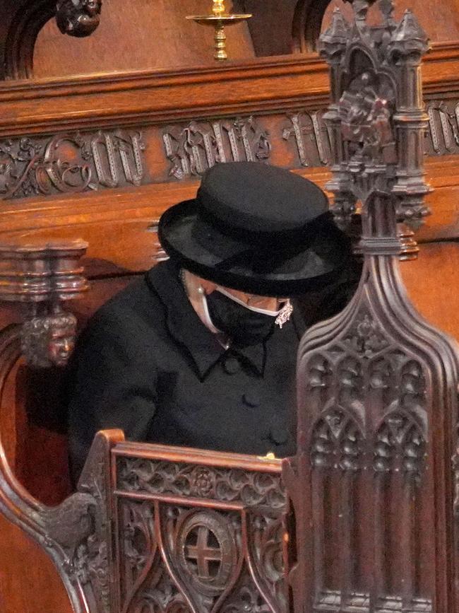 Queen Elizabeth sits alone during the funeral of Prince Philip at St George's Chapel at Windsor Castle. Picture: Getty Images.