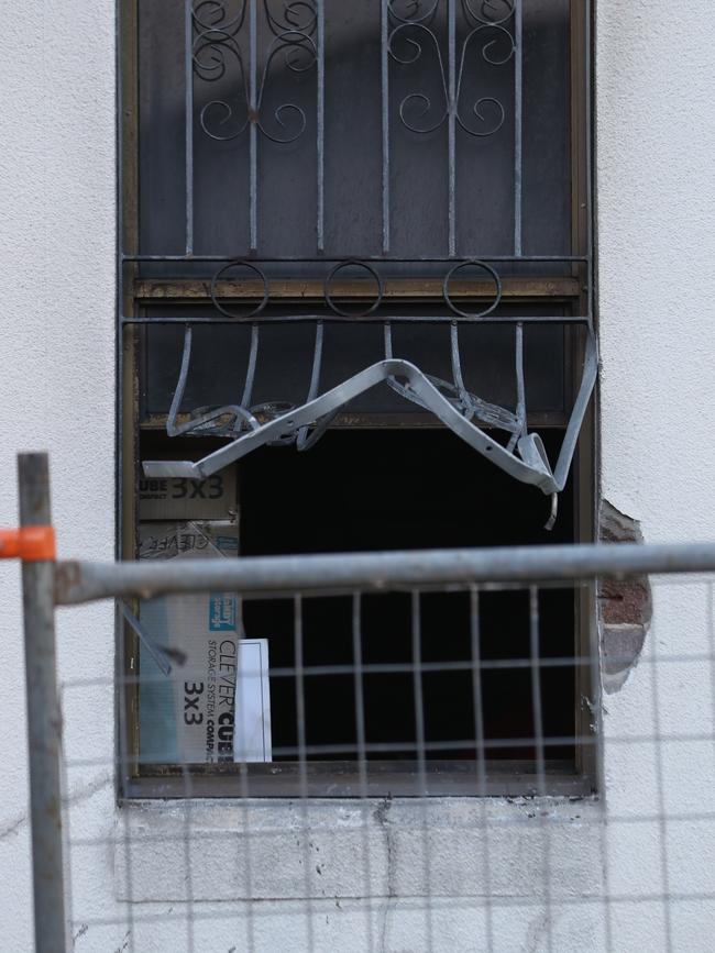 Soot was seen on the damaged window sills. Picture: John Grainger