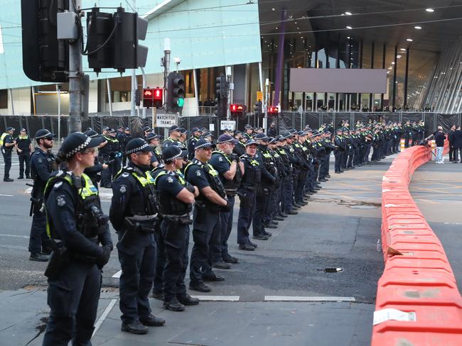 It was ‘business as usual’ inside the Land Forces expo as protests raged outside. Picture: David Crosling