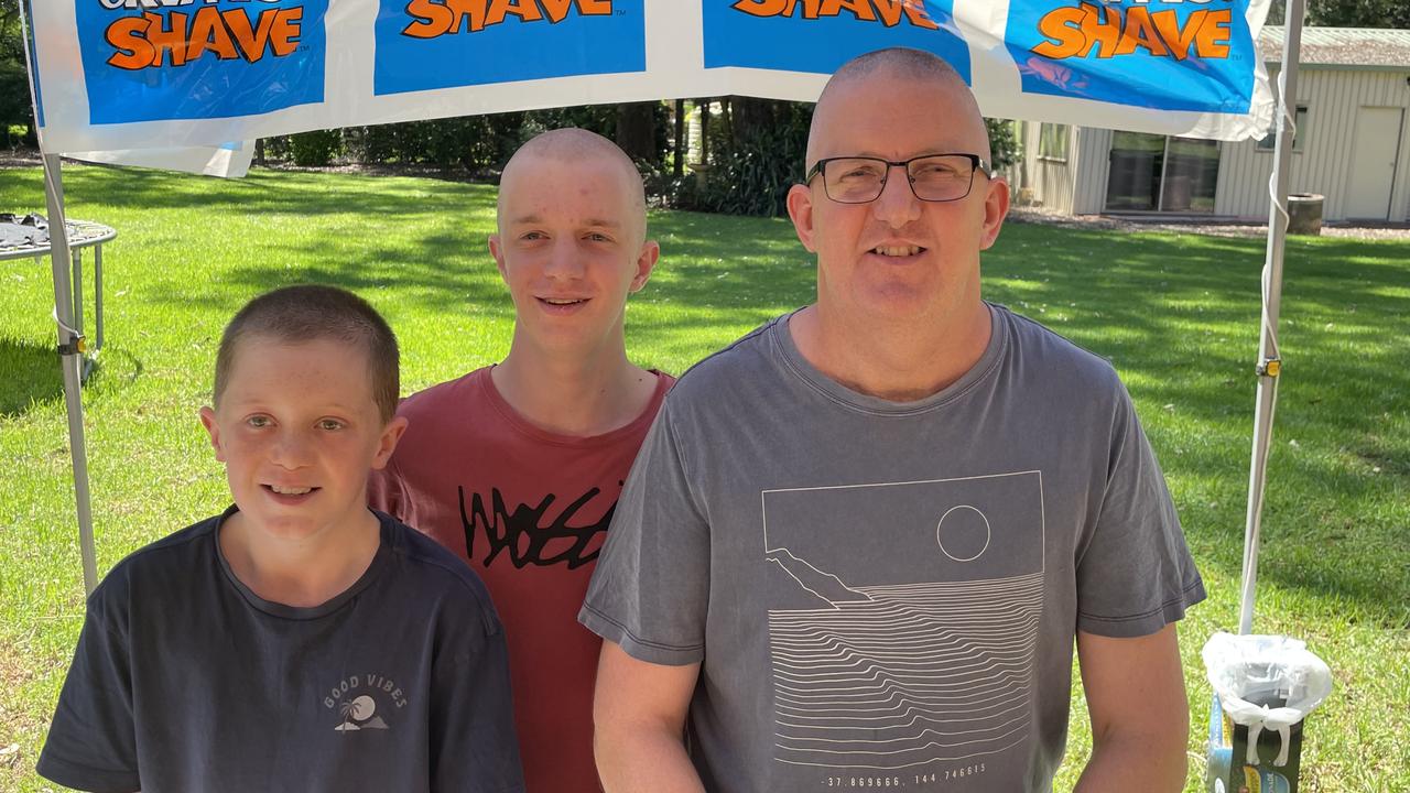 Marcus Smit and his two sons post shave.