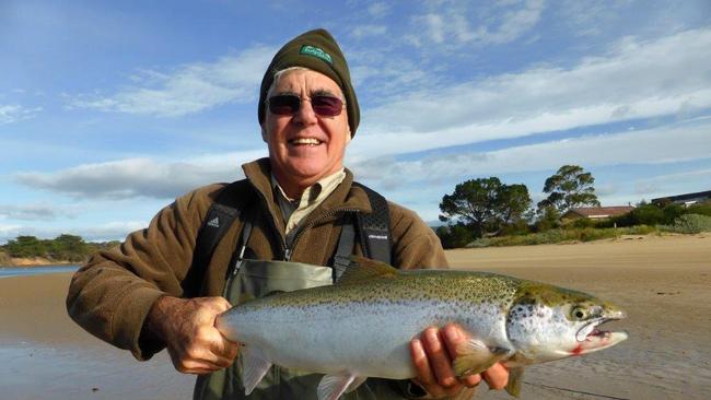 John Bessell, of Kingston, with a 2kg Atlantic salmon caught off Cremorne. Picture: Rob Bessell