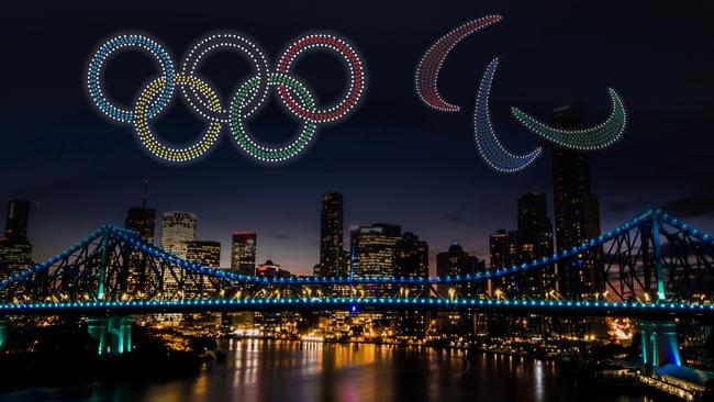 ATTENTION ATTENTION DO NOT USE CONTACT COURIER-MAIL PIC DESK BEFORE USE.......This image is embargoed through to 12:01am this Sunday 9 July 2023...... An ‘artist impression of the Olympic Rings and Paralympic Agitos’ above the Brisbane Story Bridge.