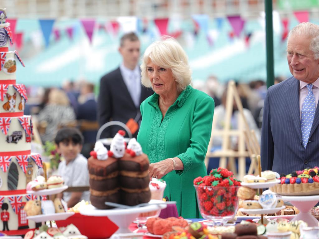 Camilla, Duchess of Cornwall looks at a celebratory cake as she attends the Big Jubilee Lunch with Prince Charles, Prince of Wales at The Oval. Picture: Getty Images