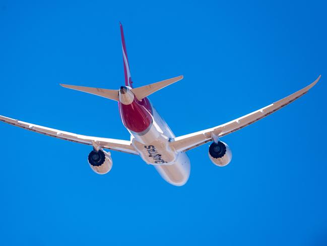 A Qantas flight leaves from Darwin for New Delhi. Picture: Che Chorley