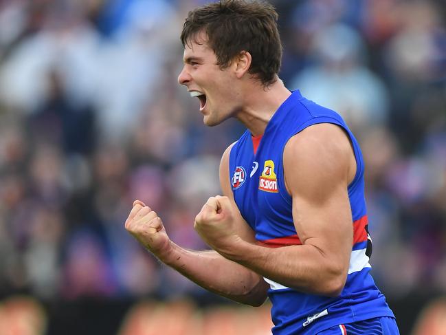 Josh Dunkley of the Bulldogs reacts after kicking a goal during the Round 8 AFL match between the Western Bulldogs and the Brisbane Lions at Mars Stadium in Ballarat, Saturday, May 11, 2019.  (AAP Image/Julian Smith) NO ARCHIVING, EDITORIAL USE ONLY