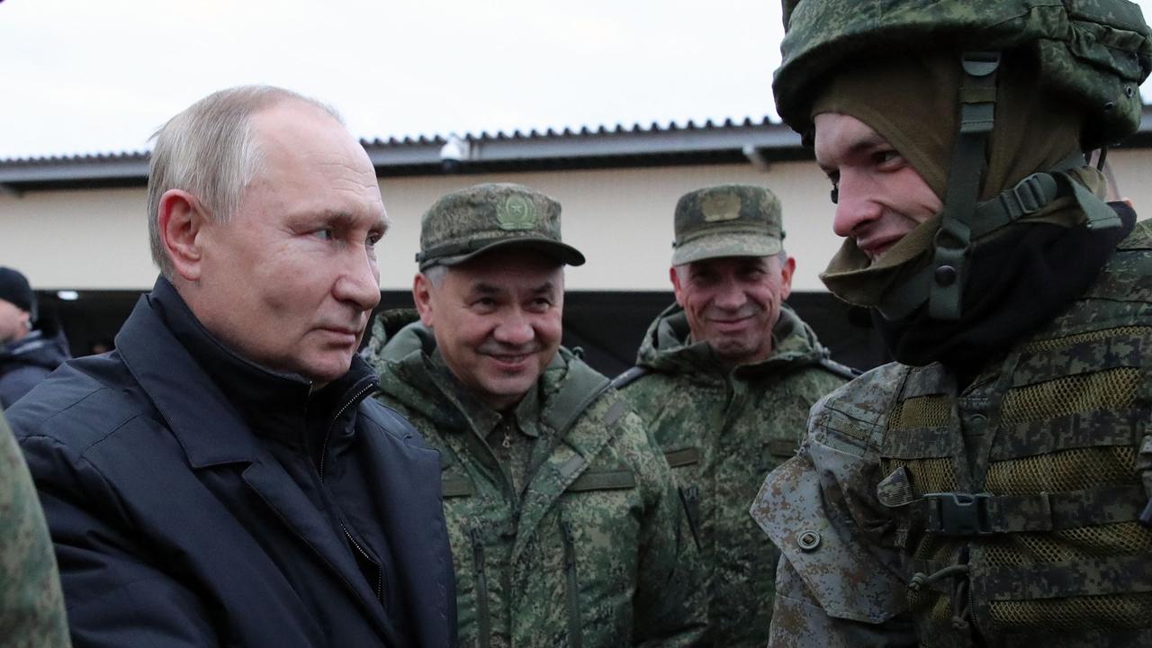 Vladimir Putin meets with Russian troops outside a military training centre. Picture: Mikhail Klimentyev/ Sputnik/AFP