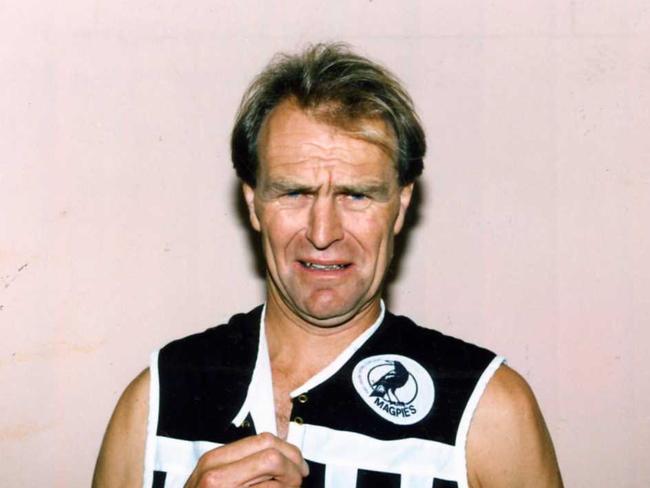 Football coach Graham Cornes wearing Port Adelaide Magpies guernsey. Vietnam veteran Graham Cornes has been assisting the Department of Veterans' Affairs with its Health Week. The craggy brekky announcer said he'd do anything for the veterans' cause. But as this photo shows, there are some things he finds harder to take. Used 18 Mar 1993.