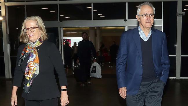 Former prime minister Malcolm Turnbull arrives back on Australian soil with wife Lucy after the Liberals’ unexpected election win. Picture: Diimex