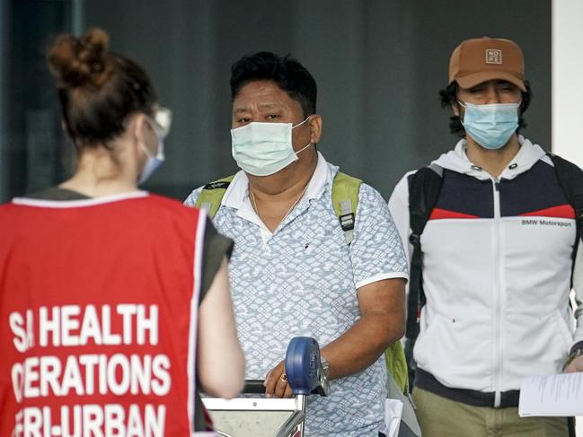 International repatriation flight passengers arrive at Adelaide Airport and bard a bus to go into quarantine, Saturday August 1, 2020 - pic MIKE BURTON