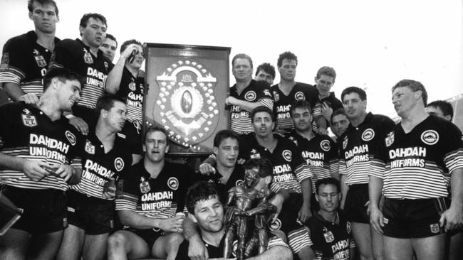 Royce Simmons and his Penrith teammates with the Winfield Cup in 1991.