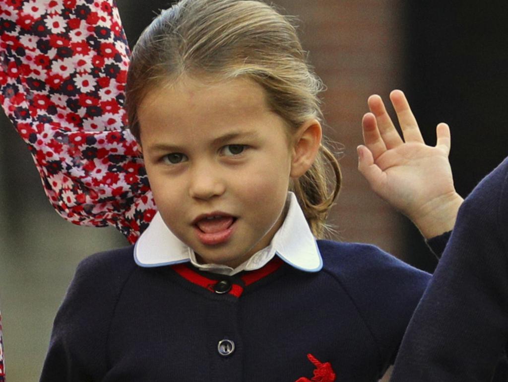 Princess Charlotte waves to photographers. Picture: Aaron Chown/Pool via AP