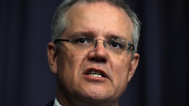 Federal Treasurer Scott Morrison speaks at a press conference at Parliament House in Canberra on Wednesday, Oct. 21, 2015. (AAP Image/Mick Tsikas) NO ARCHIVING