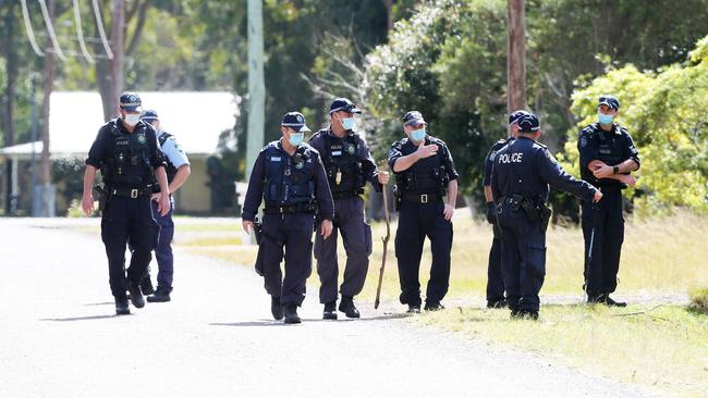 Police conduct a line search of the scene at Salt Ash the day after a man was found dead. Picture: NCA NewsWire / Peter Lorimer.