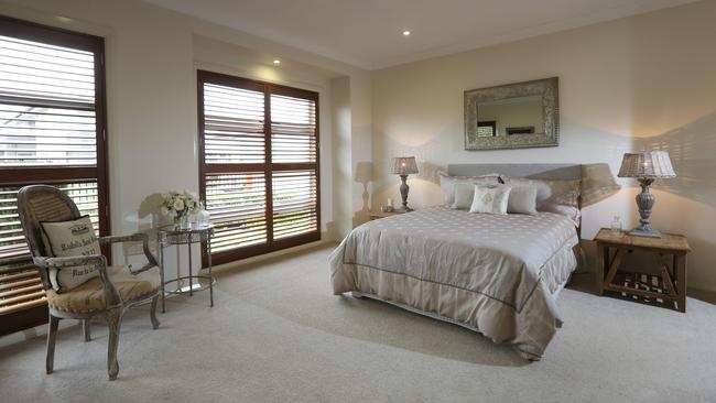 The master bedroom includes a spacious walk-in robe and ensuite.