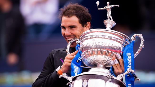 Rafael Nadal poses with the trophy after his victory against Dominic Thiem.