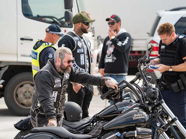 Finks outlaw motorcycle members meeting up at a service station south of Wodonga with police also in force. Picture: Simon Dallinger