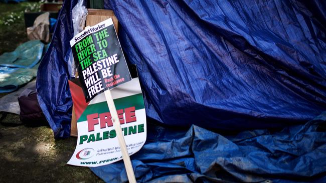 A placard reading ‘From the river to the sea Palestine will be free’ near a tent at a pro-Palestinian camp at the School of Oriental and African Studies in London. Picture: AFP