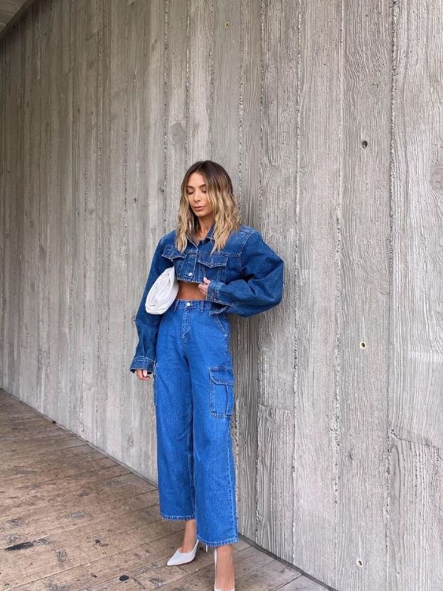 The denim crop jacket is slightly darker in shade while the cargo jeans have a lighter finish. Picture: Instagram/nadiabartel