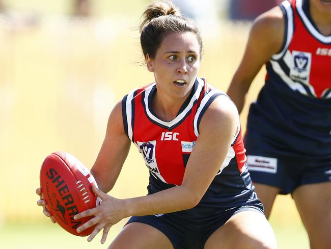 MELBOURNE, AUSTRALIA - FEBRUARY 12: Angelica Gogos of Darebin runs with the ball during the round one VFLW match between Darebin and Williamstown at LaTrobe University on February 12, 2022 in Melbourne, Australia. (Photo by Daniel Pockett/AFL Photos/via Getty Images)