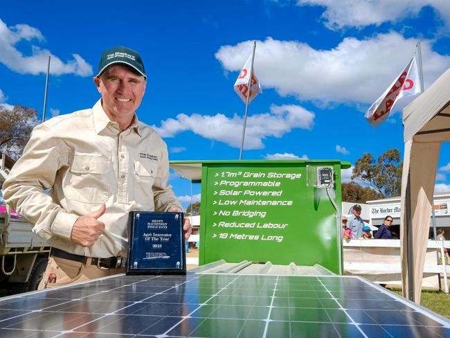 HIGH-TECH: Justin Dunn from Temora, NSW, winner of the Henty Agri-Innovators Award with the The Shepherd auto sheep feeder. Picture: Contributed