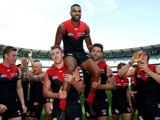 Lumumba is chaired off after his 200th game. Picture: Colleen Petch