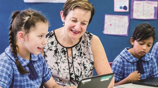 School teacher and students stock image.