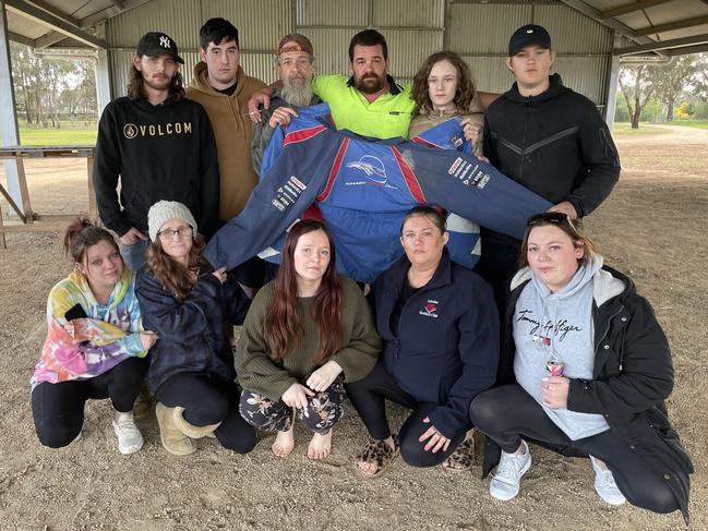 From left to right: Nathan Morrison, Callum Heywood, Dwayne Bernes, Raymond Mulder, Scotty Bernes, Tyson Mulder, Brooke Schofield, Emily Bernes, Serenity Bernes, Jamie Sims and Jessica Goodsell gathered together to remember the "Holden boy" who loved watching the Bathurst races and wearing his race jacket. Picture: Jack Colantuono