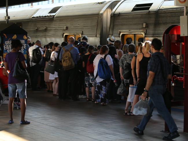 Passengers head to the Guns N‘ Roses concert at Olympic Park from Central Station last month. Crowds for Adele are expected to be much bigger because, unlike Gunners fans, most are under 50 and still alive.