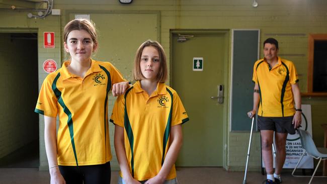 Cara Moulong and Remy Horrobin from the Cluden Cricket Club with girls co-ordinator Andrew Bath. Picture: Penny Stephens