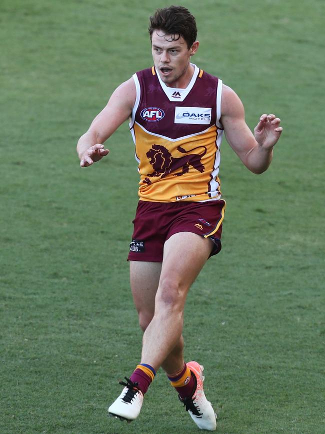 Brisbane’s Lachie Neale kicks against the Gold Coast Suns. Picture: Chris Hyde/Getty