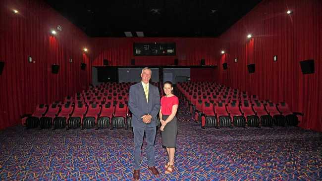 UNIQUE OPPORTUNITY: Ray White agents Richard Murray and Louisa Blennerhassett inside the Sovereign Cinema building, part of which goes under the hammer on Monday. Picture: Troy Jegers