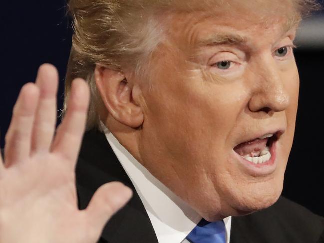 Republican presidential nominee Donald Trump answers a question during the presidential debate with Democratic presidential nominee Hillary Clinton at Hofstra University in Hempstead, N.Y., Monday, Sept. 26, 2016. (AP Photo/David Goldman)