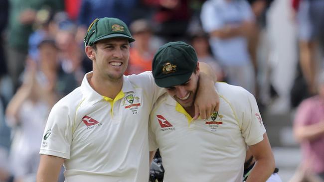 Mitchell Marsh celebrates winning the Ashes with Pat Cummins.