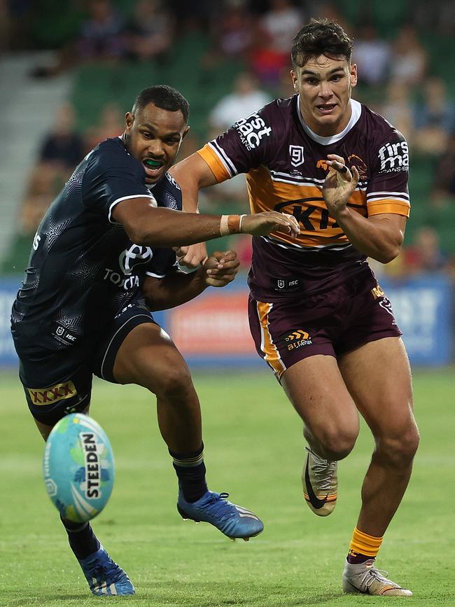 Hamiso Tabuai-Fidow of the Cowboys and Herbie Farnworth of the Broncos chase the ball during Day 1 of the 2020 NRL Nines. Picture: Paul Kane/Getty Images