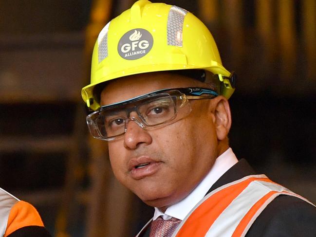 Australian Opposition Leader Bill Shorten (left) is seen talking to Liberty OneSteel owner Sanjeev Gupta (right) at the steel works in Whyalla in South Australia, Wednesday, May 1, 2019. Mr Shorten announced that if elected he will create a Renewable Energy Zone in the Spencer Gulf region of South Australia. (AAP Image/Darren England) NO ARCHIVING