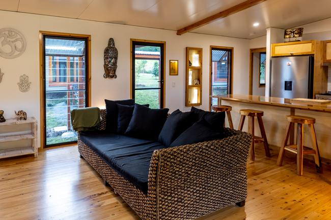 The Mount Jukes Eco Resort, built from scratch by yoga aficionado David Deakin, holds glamping tents and a half-moon shaped house that face Mt Jukes and Mr Deakin says the â€œenergyâ€ of the property has to be experienced to be understood. Picture: Contributed