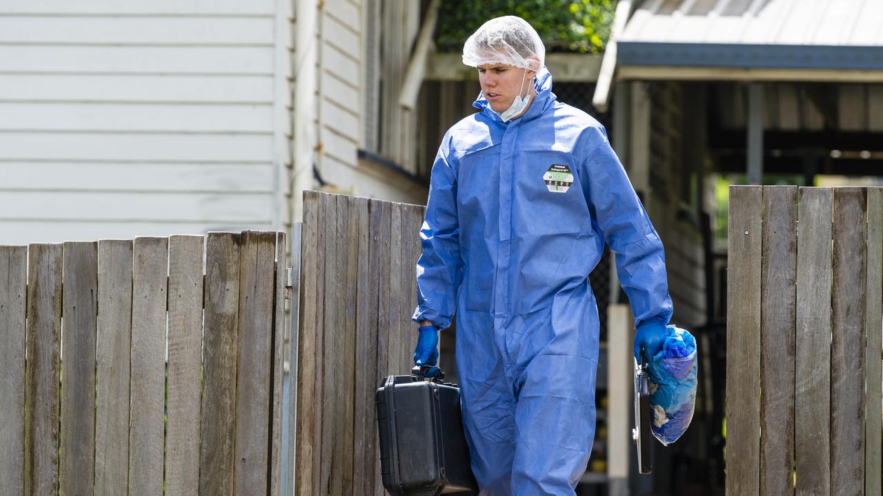 Specialist police investigate an incident at a Coonan St address in Tuesday. Picture: Kevin Farmer