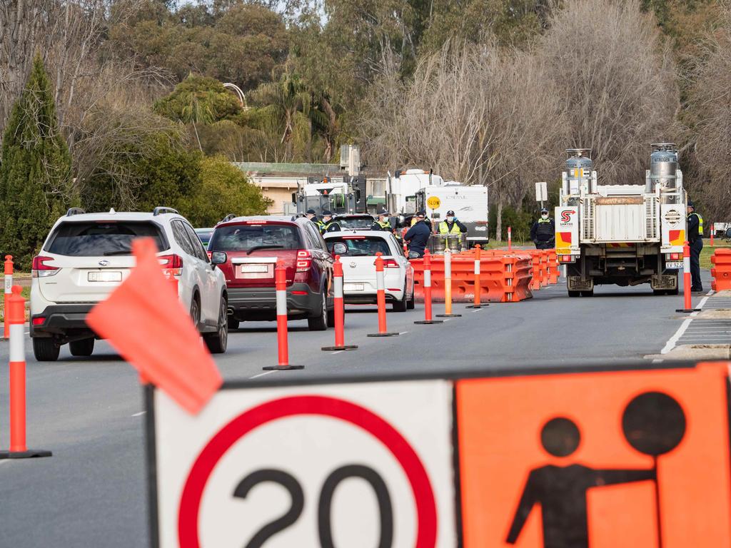 A checkpoint near the NSW Victorian border in July. Now the states’ premiers have agreed to keep borders open ahead of Christmas. Picture: Simon Dallinger