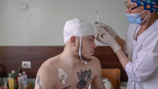 A Ukrainian soldier receives treatment in the central hospital of Mykolaiv, 100km from Odessa, western Ukraine. Picture: AFP